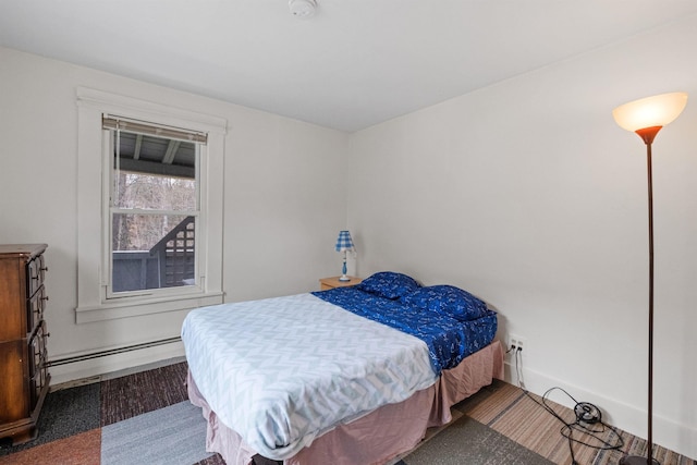 bedroom featuring baseboard heating