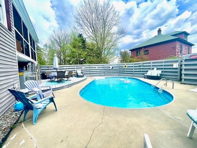 view of pool with a patio