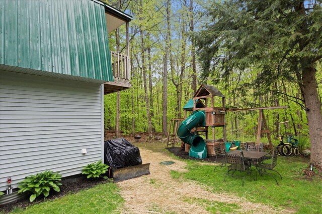 view of yard featuring a playground