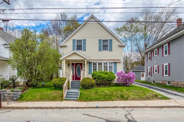 view of front of home featuring a front yard