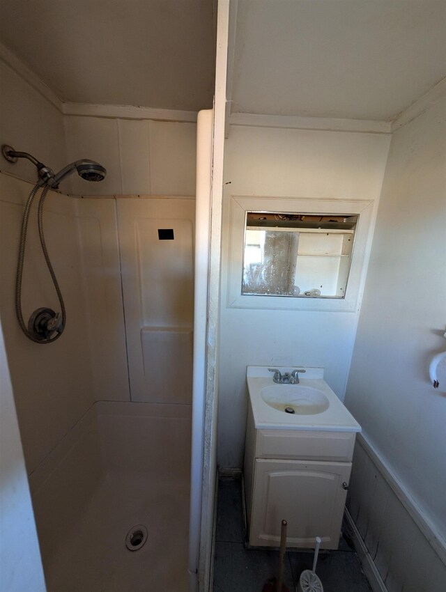 bathroom with vanity and walk in shower