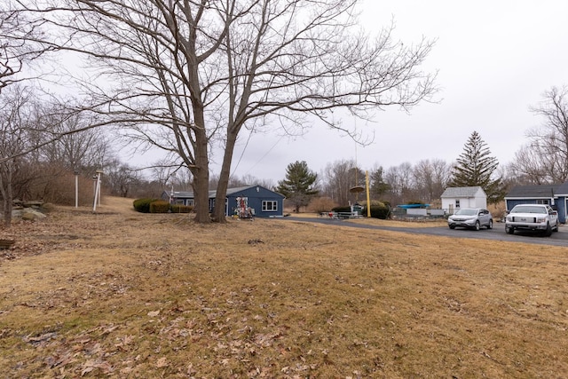 view of yard featuring a garage