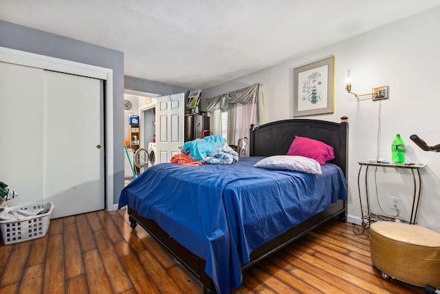 bedroom featuring a closet and wood-type flooring