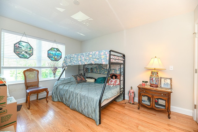 bedroom featuring hardwood / wood-style floors