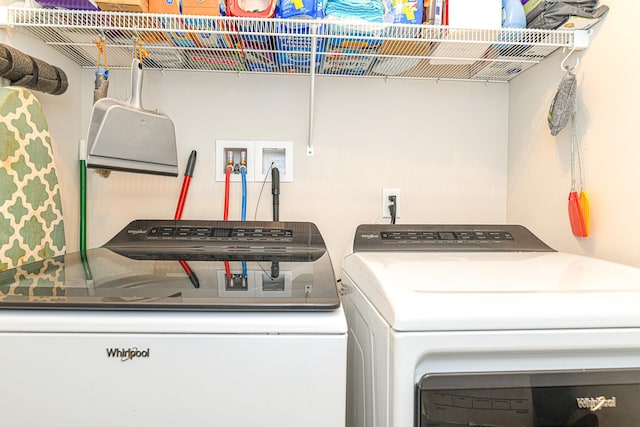 laundry room featuring separate washer and dryer