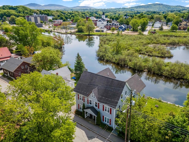 bird's eye view with a water and mountain view