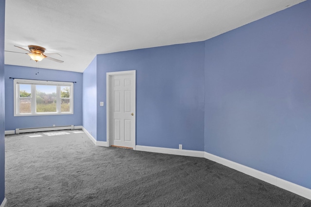 carpeted spare room with baseboard heating and ceiling fan