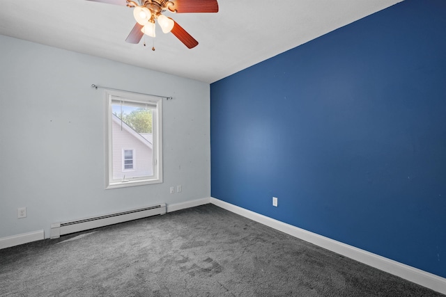 carpeted spare room featuring baseboard heating and ceiling fan