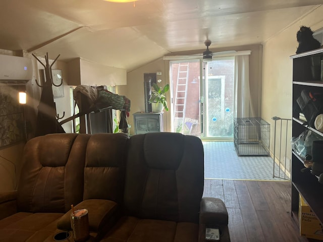 living room with wood-type flooring, vaulted ceiling, and ceiling fan