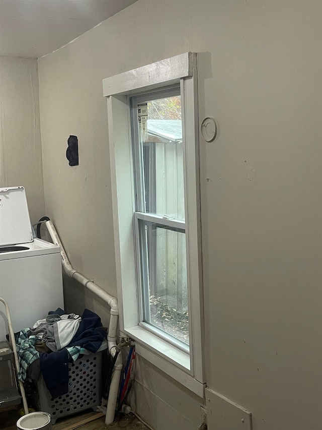 bathroom featuring washer / dryer