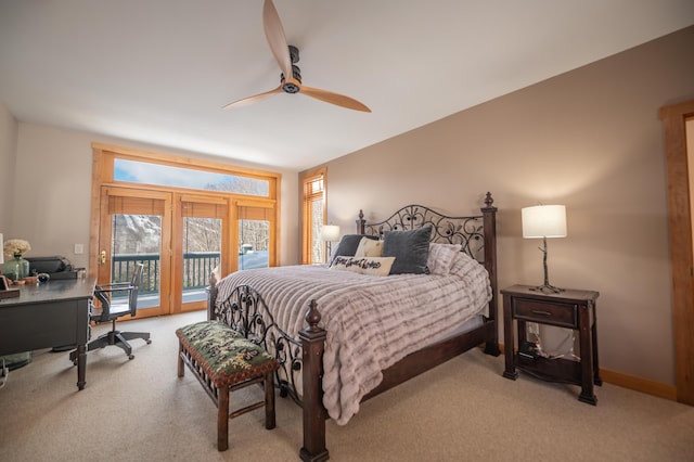 bedroom featuring access to exterior, light colored carpet, and ceiling fan