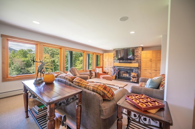 living room featuring carpet flooring and a stone fireplace