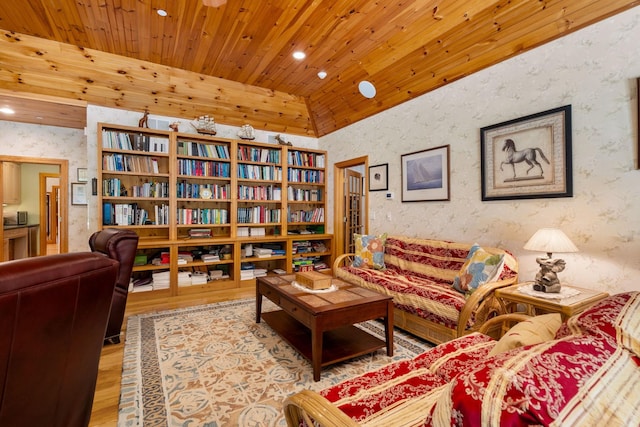 sitting room with wallpapered walls, wooden ceiling, wood finished floors, and vaulted ceiling