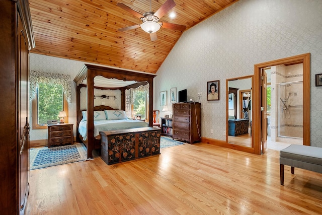 bedroom featuring wood ceiling, light wood-style flooring, vaulted ceiling, and wallpapered walls