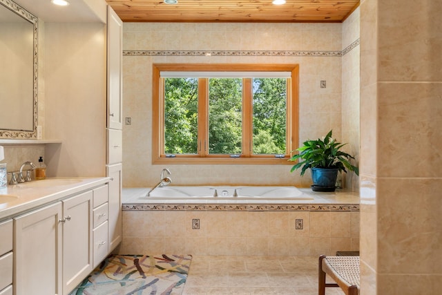 full bathroom featuring recessed lighting, wooden ceiling, vanity, and a bath