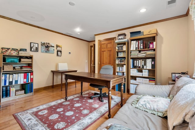 office area with visible vents, crown molding, baseboards, recessed lighting, and wood finished floors