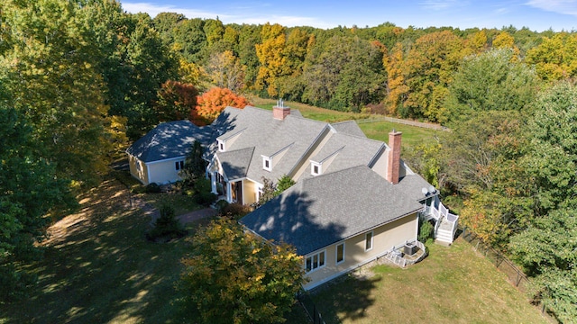 aerial view with a wooded view