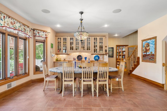 dining area with visible vents, recessed lighting, stairway, and baseboards