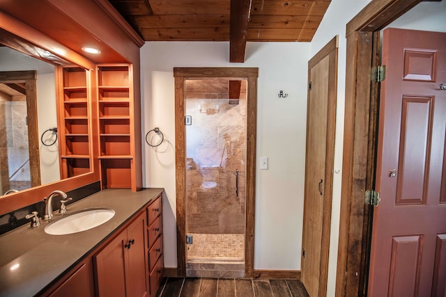 bathroom featuring vanity, beamed ceiling, wood ceiling, and an enclosed shower