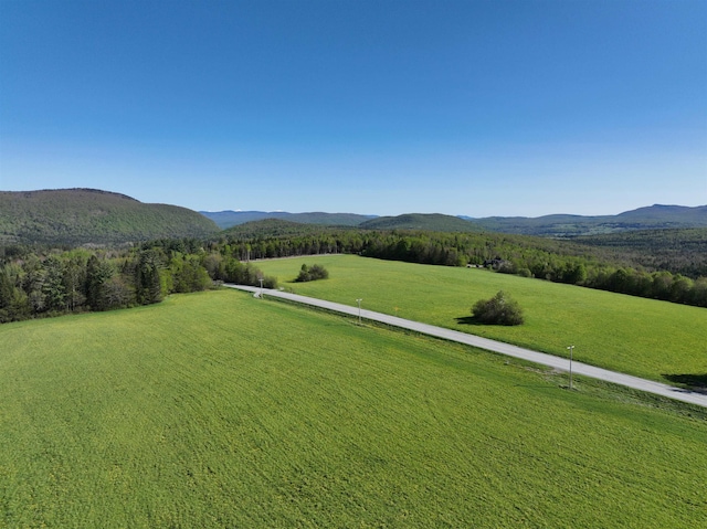 view of mountain feature with a rural view