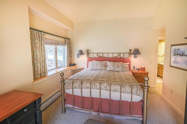 carpeted bedroom featuring baseboard heating