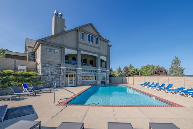 view of pool featuring a patio area