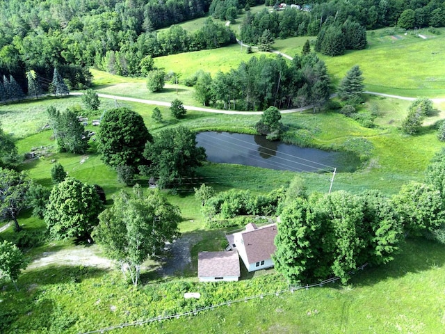 bird's eye view featuring a rural view and a water view