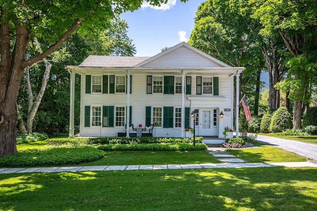 view of front of home with a front yard