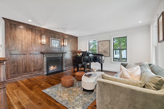 living room featuring crown molding and dark wood-type flooring