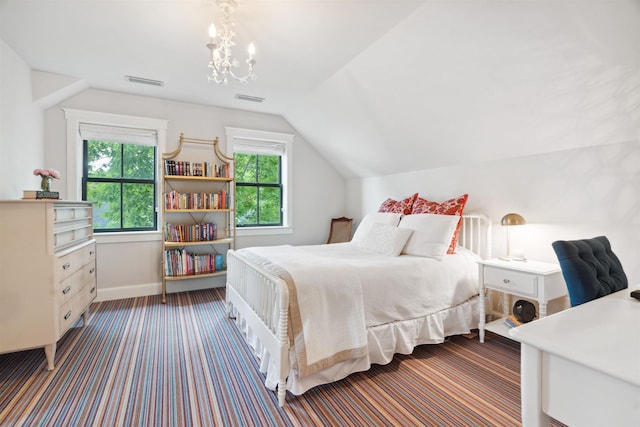 bedroom featuring vaulted ceiling