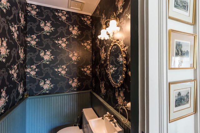 bathroom featuring sink and toilet