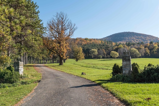 view of street featuring a mountain view and a rural view