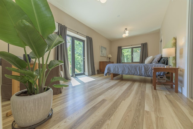 bedroom with light hardwood / wood-style floors