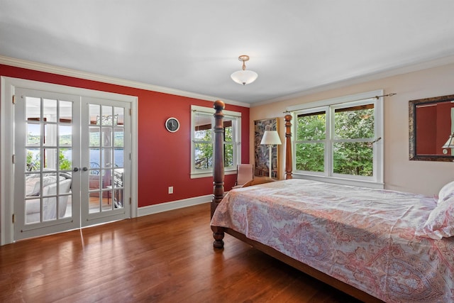 bedroom featuring access to exterior, crown molding, french doors, and hardwood / wood-style floors