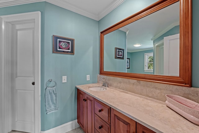 bathroom featuring vanity, tile patterned floors, and ornamental molding