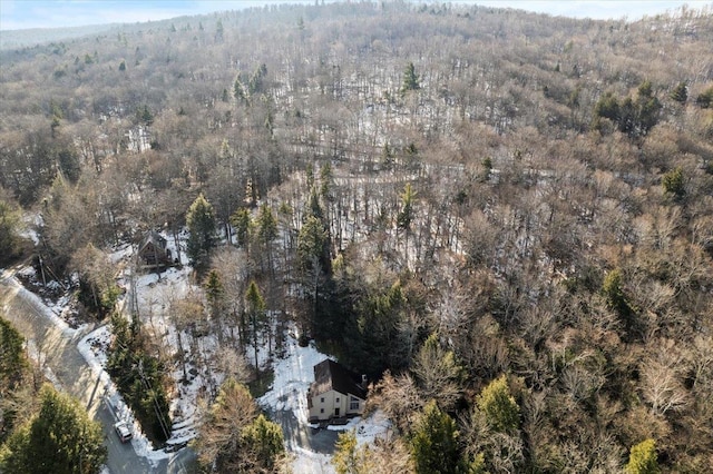 drone / aerial view with a view of trees