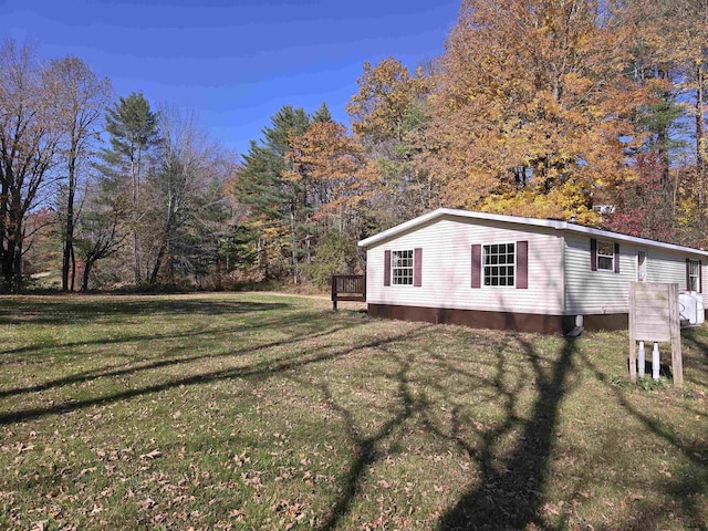 view of yard featuring a deck