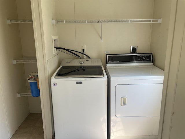 laundry area featuring washing machine and dryer