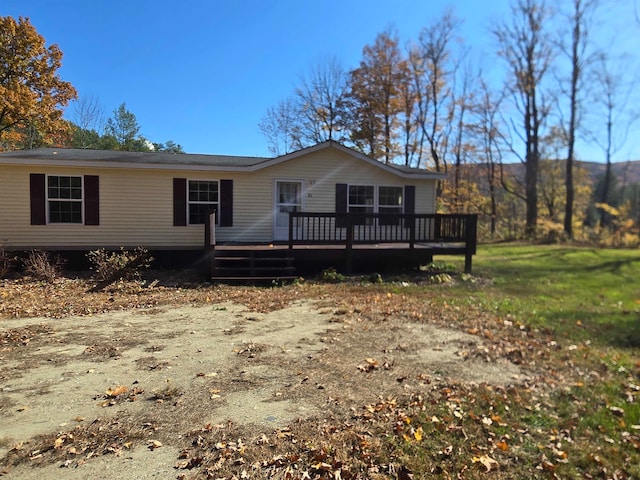 view of front of house featuring a deck