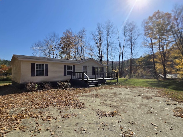 view of front of house featuring a deck