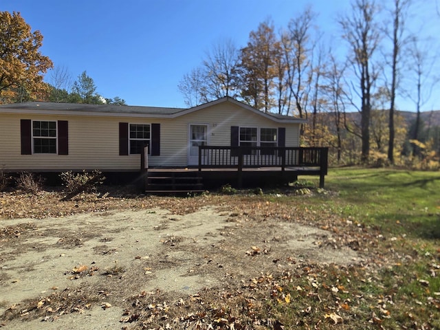 view of front of property featuring a deck