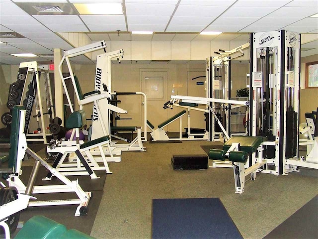 gym featuring a paneled ceiling