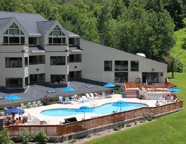 view of swimming pool with a patio