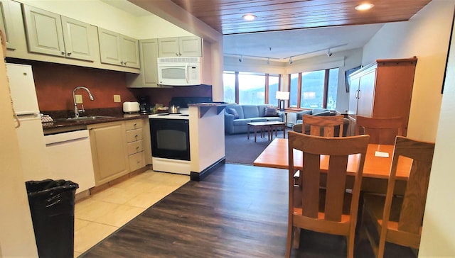 kitchen featuring white appliances, sink, wood ceiling, and light hardwood / wood-style flooring