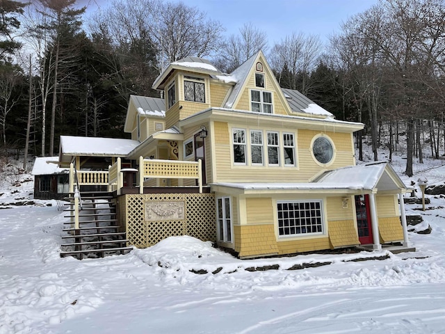 view of front of house with a wooden deck