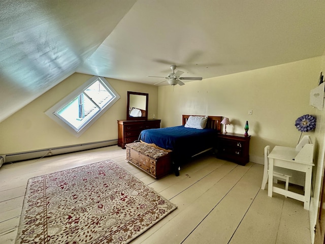 bedroom with baseboard heating, ceiling fan, and vaulted ceiling