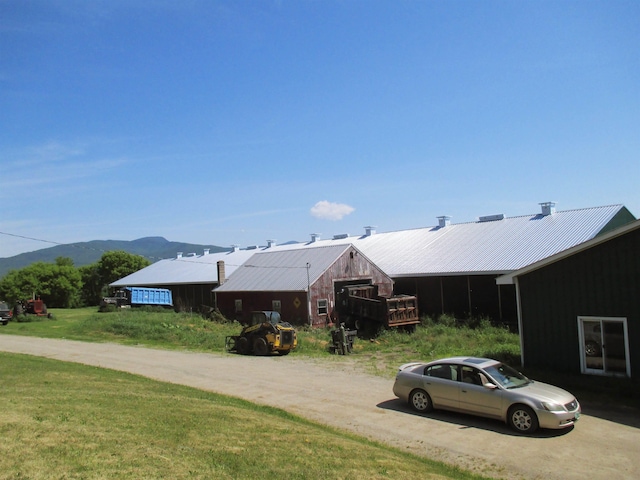 exterior space featuring a mountain view