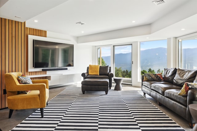 living room featuring wooden walls