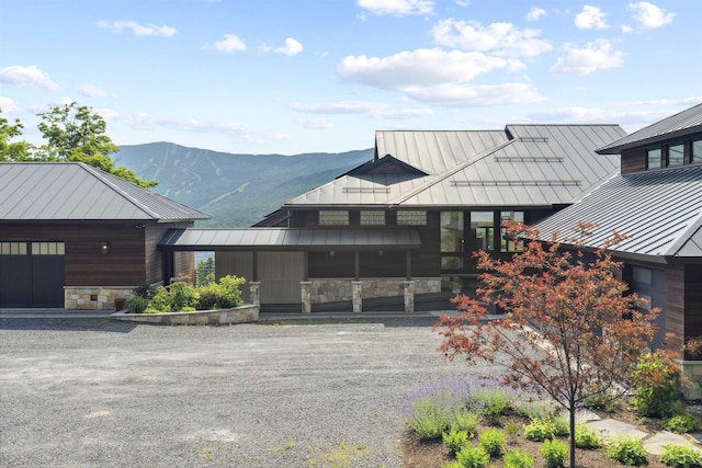 view of front of home featuring a mountain view