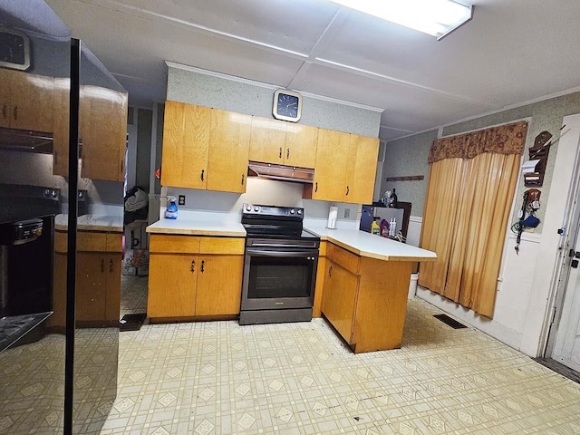 kitchen featuring under cabinet range hood, a peninsula, range with electric stovetop, light countertops, and light floors